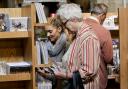 People browsing a similar event to the one coming to Sudbury Library this autumn