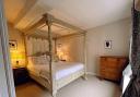 The four poster room at The Bull Inn