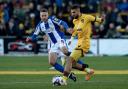 Cole Skuse (left) has been released by Colchester United and is set to be named the new manager of Bury Town.