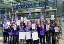 Parents and staff from a Sudbury primary school gathered outside the Suffolk County Council HQ today to protest job cuts.