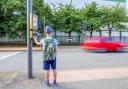 There is no legal age a child must be to cross the road all by themselves in the UK