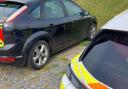 A vehicle was seized in a Suffolk town after a driver was caught displaying antisocial driving