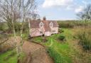 Walnut Tree Cottage in Combs is for sale at a £500,000 guide