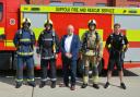 Firefighters George Trott, left, Grant Whitehead, Councillor Steve Wiles, Crew Manager Paul Shattock, and Firefighter Ashley Buxton ahead of their marathon on Sunday