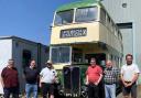 Transport Museum volunteers with the bus recently returned to Ipswich.