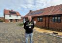 Stephen Jones, senior project manager for Flagship Homes, in front of the new homes at South Close, Leiston