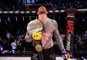 Colchester's James Webb celebrates winning the light heavyweight title at Cage Warriors 180