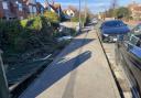 The car destroyed the picket fence of a property in Church Road before continuing into the front garden