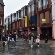 Sales shoppers braving the rain in Ipswich town centre on Monday