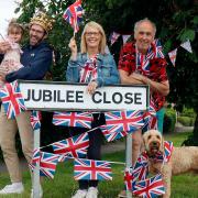 Jubilee Close in Laxfield, one of the most patriotic roads in the county, and celebrating the weekend are George Ryan holding India, Wizzo and Alex Denholme but not forgetting a very patriotic Scooter