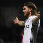 Wes Burns celebrates at Adams Park during the win over Wycombe Wanderers.