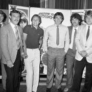 Bobby Robson and the Ipswich Town stars who appeared in Escape to Victory with Gaumont manager David Lowe at the Ipswich premiere of the film - now to mark the film's 40th anniversary a charity dinner will raise funds for children with life-limiting