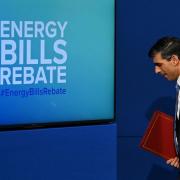 Chancellor Rishi Sunak leaves after speaking at a press conference about the Ofgem energy cap increase in Downing Street, London.