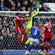 Ipswich Town keeper Christian Walton with an early save.