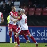 Elliott List celebrates converting the penalty that won the game for Stevenage against Colchester United.