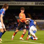 Lee Evans battles with Benny Couto in the first staging for the clash with Oldham