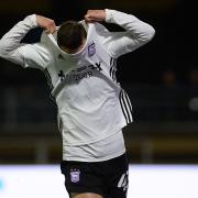 Bersant Celina celebrates his second goal with his trademark shirt removal at Adams Park against Wycombe.