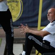 Paul Cook before kick-off at Burton Albion.