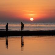 The sunrises over the calm sea at Shingle Street on the hottest day of the year.  Picture: SARAH LUCY BROWN