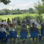 Pupils met MP James Cartlidge outside at Stratford St Mary Primary School