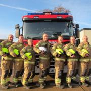 Aston Everett, second from right, was just 54 years old when he passed away in the New Year