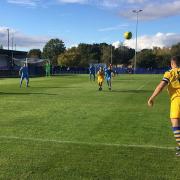 AFC Sudbury's Joe Whight launches a long throw into the danger area. 'Non-elite' non-league has taken a big financial hit over the last year