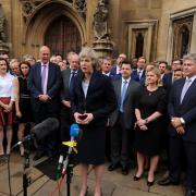 Theresa May outside the Houses of Parliament in Westminster