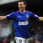 Former Ipswich Town defender Tommy Smith has signed for the MK Dons