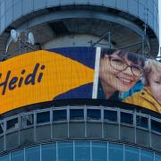 The BT Tower in London is emblazoned with a Suffolk mum-of-three's message of thanks to a charity volunteer who stopped her family from 'reaching rock bottom'.