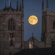 A full moon over King's Lynn Minster in 2015