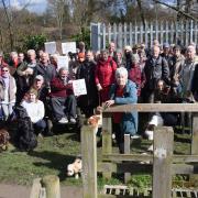 Protesters gathered at the bridge last year to demand action over the bridge and the metal fence.