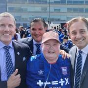 Terri with Ipswich Town's owners, Brett Johnson, Berke Bakay and Mark Detmer