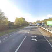 The A14 has been closed after a car overturned following a crash