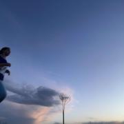 Caitlin Running with a sunset backdrop