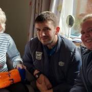 Surprise visit to 98-year-old fan from Ipswich Town FC representatives