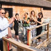 Rougham Estate owner George Agnew and staff celebrating the launch of the sunken garden and terrace