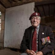 In 2022, Bill Gladden made the journey back to the barn in Normandy where his life was saved. Image: Robin Savage