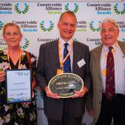 Robert Gooch, centre, of The Wild Meat Company, Woodbridge, receiving his Countryside Alliance award