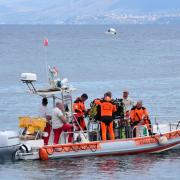 The Italian coastguard were searching the area after a luxury boat sank during a storm off Sicily last week, killing seven people