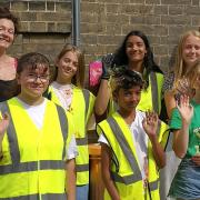 Artists from the James Holloway Youth Arts Fund took on a project to repaint bollards around town