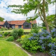 This detached barn conversion is for sale at a guide price of £1 million