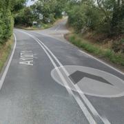 The A1071 is closed after two lorries crashed on Tuesday morning.