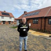 Stephen Jones, senior project manager for Flagship Homes, in front of the new homes at South Close, Leiston