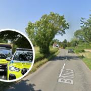 A car was left overturned in a field after a car crashed on a road just off the A12.