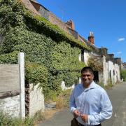 Cllr Indy Wijenayaka, of West Suffolk Council, says an agreement to restore derelict stables in a town high street is 