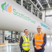 Charlie Jordan, CEO ScottishPower Renewables (in yellow hi-vis vest) with Darren Davidson, UK and Ireland Vice President for Siemens Energy and Siemens Gamesa (in orange hi-vis).