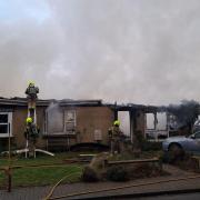 Photographs show the aftermath of a fire that ripped through a bungalow in Sutton Heath