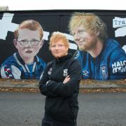 Ed Sheeran visited the mural ahead of this afternoon's clash with Manchester United.