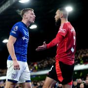 Liam Delap squares up to Noussair Mazraoui during Ipswich Town's 1-1 home draw with Manchester United.