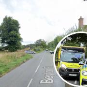 A driver has been taken to hospital after a crash between a car and a van in a village.